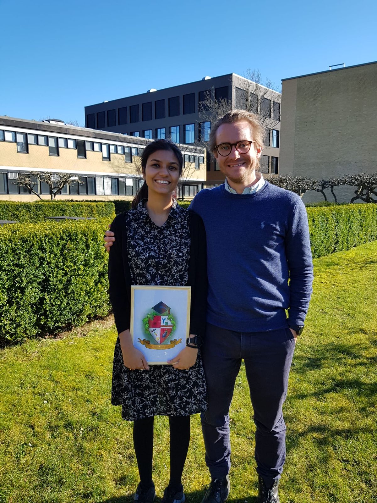 Image of coauthors Tulika Laprade and Andreas Laustsen-Kiel standing next to each other. 