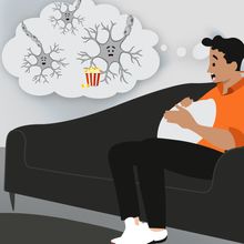 Cartoon showing the neurons in the brain enjoying the frightening movie the person is watching.