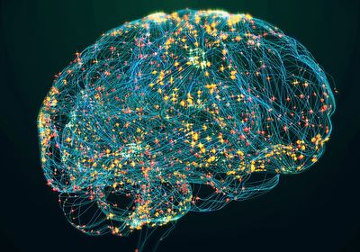 A depiction of a human brain in blue lines and yellow and red dots.